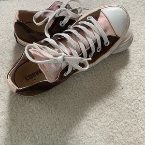 Brown and pink converse